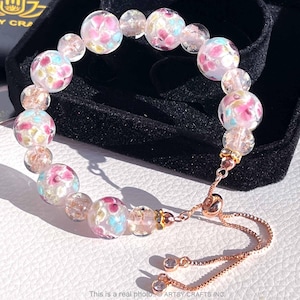 ARTSY Crafts Lily Flower Glow in the Dark Firefly Beads Bracelets, Adjustable Murano Glass Beads Jewelry for Women Stackable Bangles