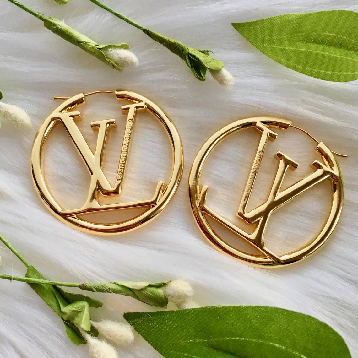 Shop Louis Vuitton Louise hoop earrings (M80136, M64288) by