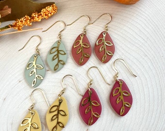 Polymer clay dangle earrings with gold plated leaf charms Handmade botanical jewelry Affordable accessories for women