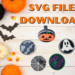May include: Five Halloween-themed SVG files for download. The files include a pumpkin, a ghost, a bat, a spider web, and a "Trick or Treat" design. The designs are shown on a white wooden background with Halloween decorations.