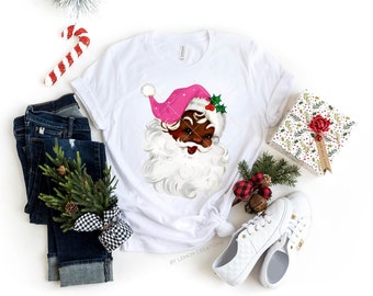 Camiseta gráfica vintage de Papá Noel negra con gorro rosa para Navidad