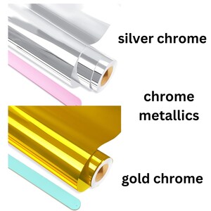 May include: Two rolls of chrome metallic vinyl wrap. The top roll is silver chrome and the bottom roll is gold chrome. Chrome metallics.