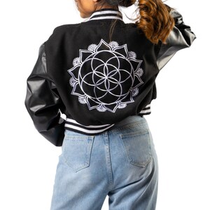 The Sacred Evolution Varsity Crop