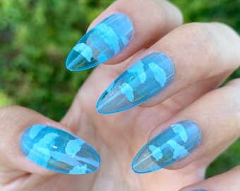 Blue Sky Clouds Medium Almond Press On Nails - 24 Pieces + Full Kit with Stickers, Glue, Cuticle Pusher, and Nail File