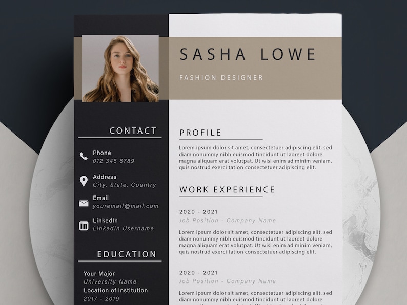 May include: A black and white resume template with a professional headshot of a woman. The resume includes contact information, work experience, education, and a profile section. The text on the resume is in a simple, clean font.