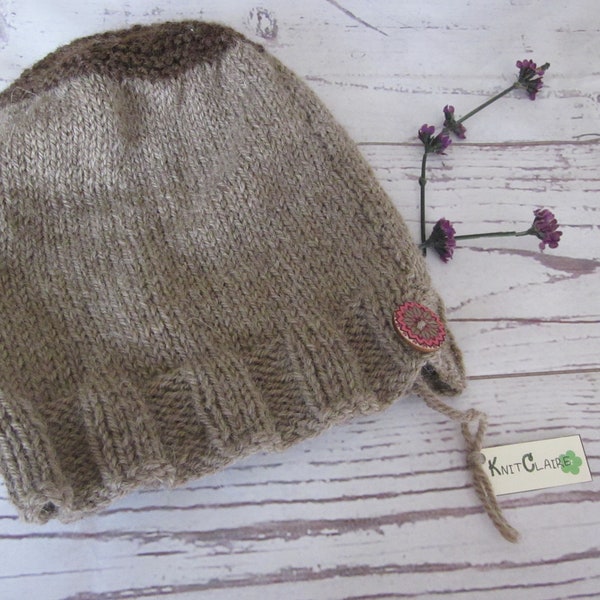 Dark and light brown beanie can be worn slouchy or rolled up for close fitting. Comes with KnitClaire button and spare yarn