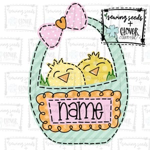 May include: A light blue Easter basket with a pink bow and two yellow chicks inside. The basket has a pink and orange border and the text "name" in a pink rectangle.