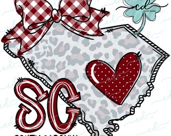 May include: A red and white checkered bow sits on top of a gray and white leopard print outline of the state of South Carolina. The letters "SC" are in red with a white outline and the words "SOUTH CAROLINA" are below. A red heart with white polka dots is in the center of the state outline.