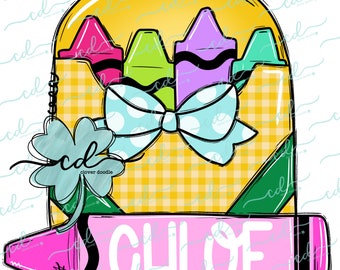 May include: A yellow box with a green, purple, pink, and green crayon inside. A blue bow with white polka dots is on top of the box. A green four-leaf clover is on the left side of the box. A pink crayon with the name "CHLOE" written on it is at the bottom of the image.