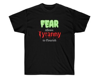 May include: Black t-shirt with the words "FEAR Allows Tyranny to Flourish" in green and red text. The word "FEAR" is in a light green, and the word "Tyranny" is in a dripping red font.