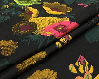 May include: Black fabric with a floral pattern featuring yellow, pink, and green flowers. The fabric has a textured, woven look.