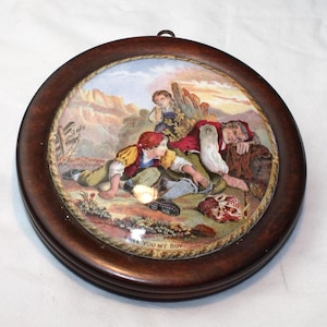 I See You My Boy - Antique Prattware Pot Lid mounted in a Wooden Frame - No. 318A; Victorian. Circular painted wall hanging.