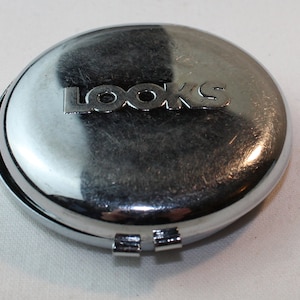 Pocket Mirror; Looks Vintage Silver tone compact, circular.