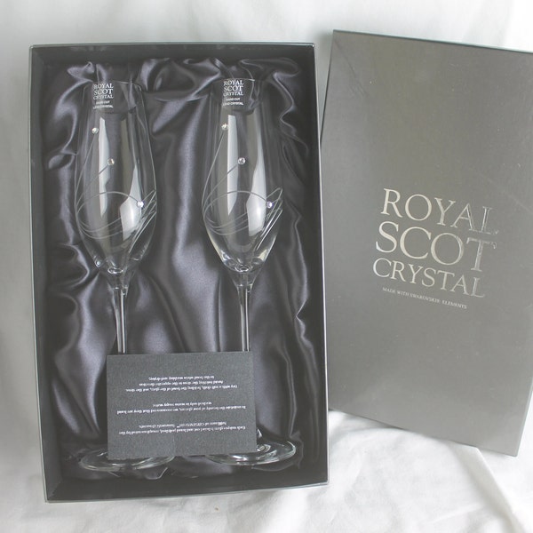 Two Champagne Flutes, hand cut, Lead Crystal by Royal Scot in a Satin Lined Box with a Diamante and Spiral Design Made by Swarovski