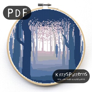 May include: A digital cross stitch pattern of a person walking through a blue and purple forest. The pattern is displayed in a wooden embroidery hoop. The text "KittySPatterns" and "Etsy.com/shop/KittySPatterns" is displayed at the bottom of the image.