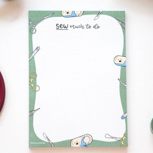 May include: Green notepad with a white grid pattern and a rounded edge. The notepad has a border of medical tools and the text "SEW much to do".