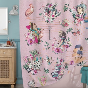 May include: Pink shower curtain with a whimsical Alice in Wonderland theme. The design features characters like the Mad Hatter, the Queen of Hearts, and Alice herself, along with playing cards, teacups, and flowers.