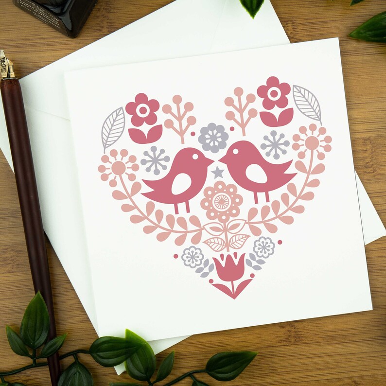Love bird card - two love birds within a heart in a nordic inspired design.