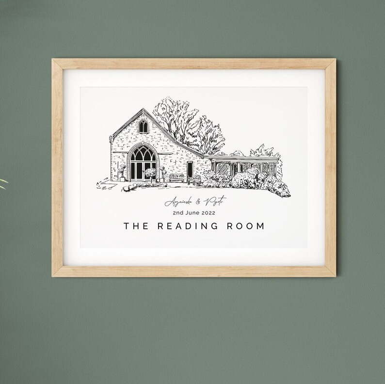 A print of a wedding venue illustration of The Reading Room. The print has an image of the building on it with the names of the couple and their wedding date beneath it. Printed in black on white