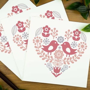 Love bird card - two love birds within a heart in a nordic inspired design.