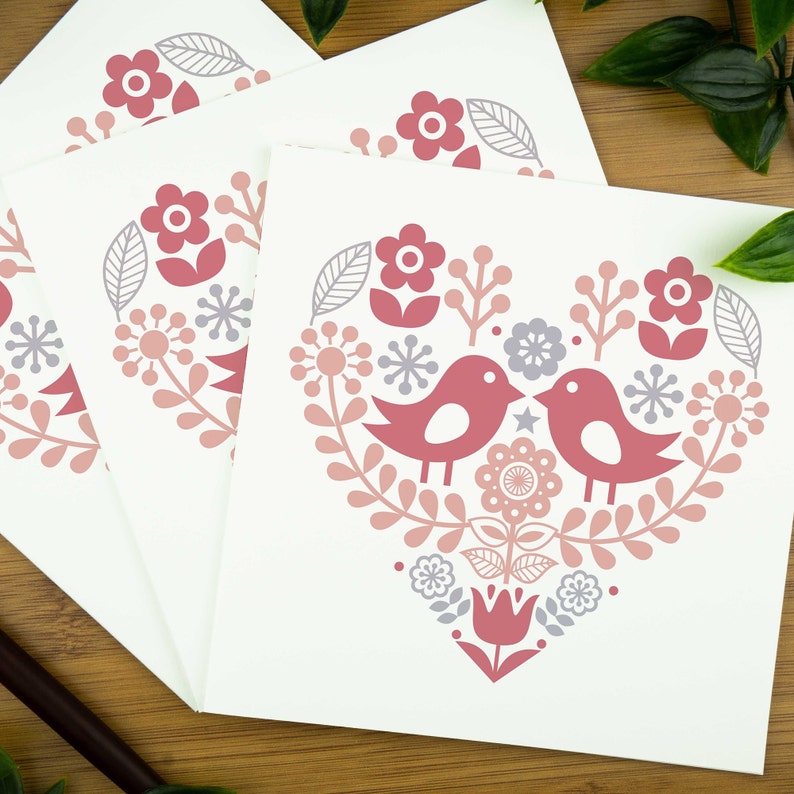 Love bird card - two love birds within a heart in a nordic inspired design.