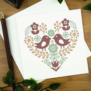 Love bird card - two love birds within a heart in a nordic inspired design.