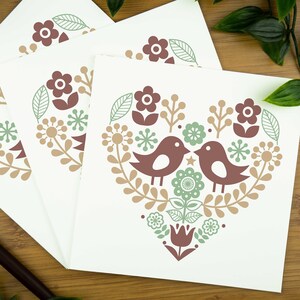 Love bird card - two love birds within a heart in a nordic inspired design.