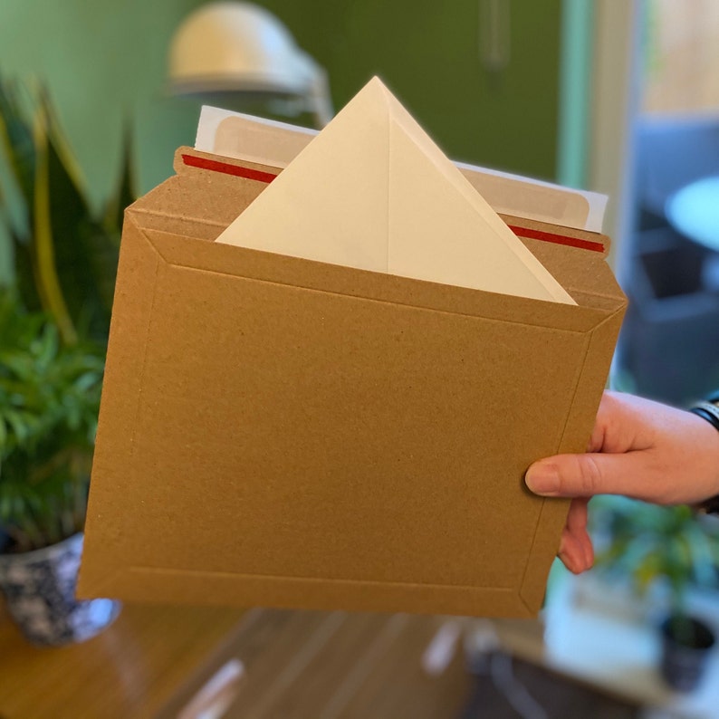 An image of the reinforced cardboard outer envelope used to send the cards in.