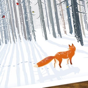 A close up of the fox staring into the snowy trees on the front of the Christmas card.