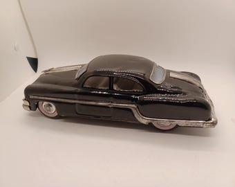 1954 Pontiac Chieftain friction toy car 10" DELHI minister DELUX, pullback tin car, black