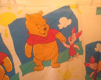 One (1) winnie the pooh, and piglet, flat twin sheet / fabric (one is damaged) disney, hundred acre wood, bed, bedding, cotton, polyester
