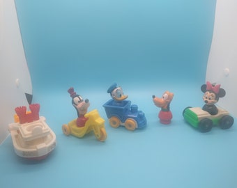 ONE (1) Disney Illco, little people, fisher price, playmates, Mark Twain, minnie mouse, pluto, goofy, donald duck, in and out school bus