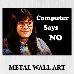 May include: Metal wall art featuring a person with long brown hair wearing glasses and a colourful shirt. The text "Computer Says NO" is written in white letters on a black background.