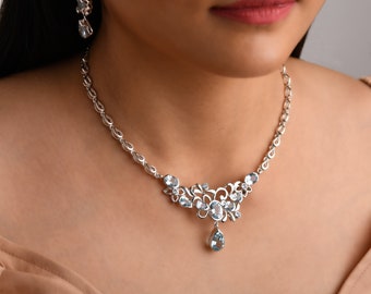 Collana topazi azzurri e fiori oro - Gioielli - Collane - di Luzzi