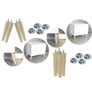 Op de afbeelding: Set van vier houten meubellepoten met metalen schroeven, vier metalen montageplaten en een wit kastje met vier poten.