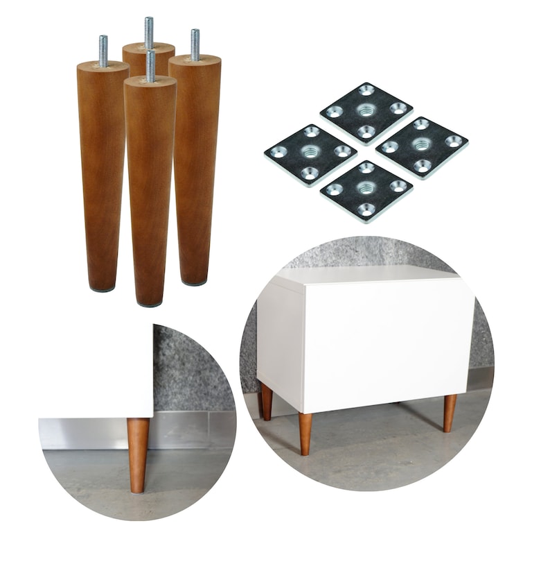 May include: Four wooden legs with metal mounting plates, shown assembled on a white cabinet with a drawer. The cabinet is on a gray surface.