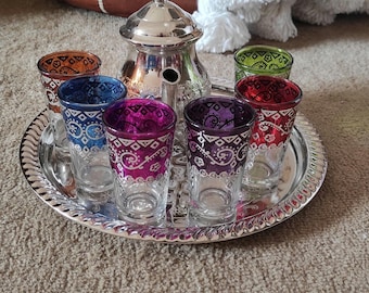 40% OFF (3 X 1) Moroccan craftsmanship, Moroccan stainless steel teapot set, six beldi tea glasses and serving tray.