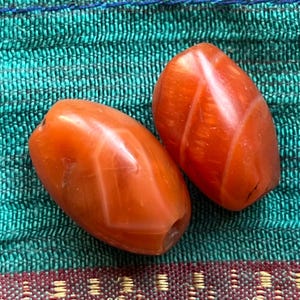 Pair of Tibetan Pema Raka Carnelian Beads