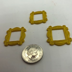Peep hole frame for a dolls house door