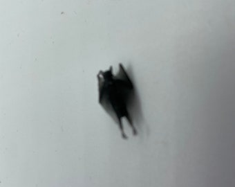 Teeny tiny hanging bat