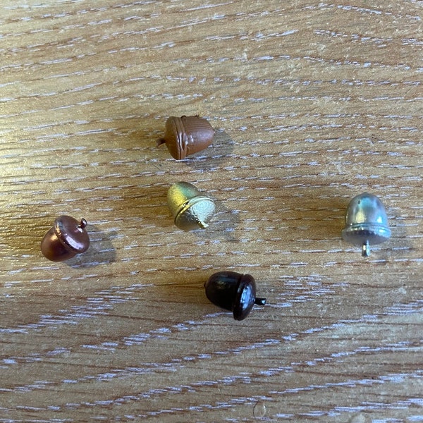 Tiny miniature acorns