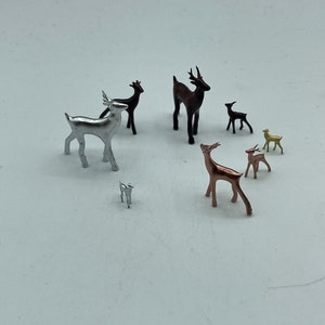 Elegant miniature buck deer in different sizes