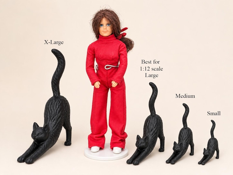 May include: A doll wearing a red long-sleeved jumpsuit and white shoes stands next to four black cat figurines in varying sizes labeled X-Large, Best for 1:12 scale Large, Medium, and Small. Each cat is in a stretching pose with an arched tail.