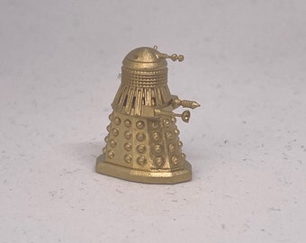 Detailed little miniature sci-fi robots, 3D printed tiny robot figurines, futuristic dollhouse decor, collectible robot sculptures.
