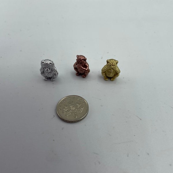 Three wise monkeys in miniature