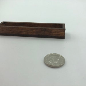 Little wooden window box for a dolls house