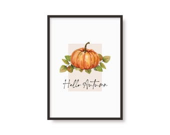 Könnte beinhalten: Ein druckbarer Kunstdruck mit einer Aquarell-Illustration eines orangefarbenen Kürbisses mit grünen Blättern und dem Text "Hello Autumn".