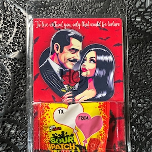 May include: A novelty gift set featuring a red card with a couple illustration and the text "To live without you, only that would be torture." Below is a package of Sour Patch Kids candy with heart-shaped labels.