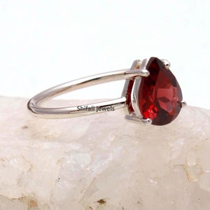 Pear Cut Garnet Ring: Prong Set Sterling Silver January Birthstone
