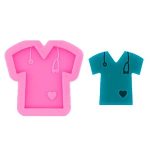 May include: Pink silicone mold shaped like a medical scrub top with a stethoscope and heart design.